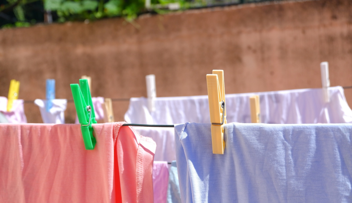 Clothes drying on a clothesline outside. 