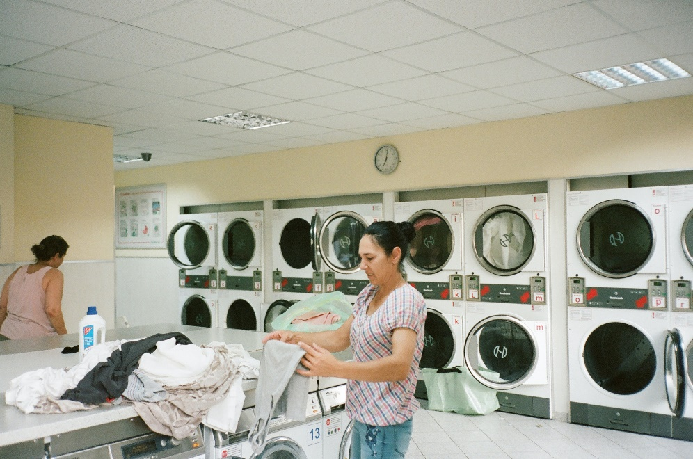 Two women at the laundromat