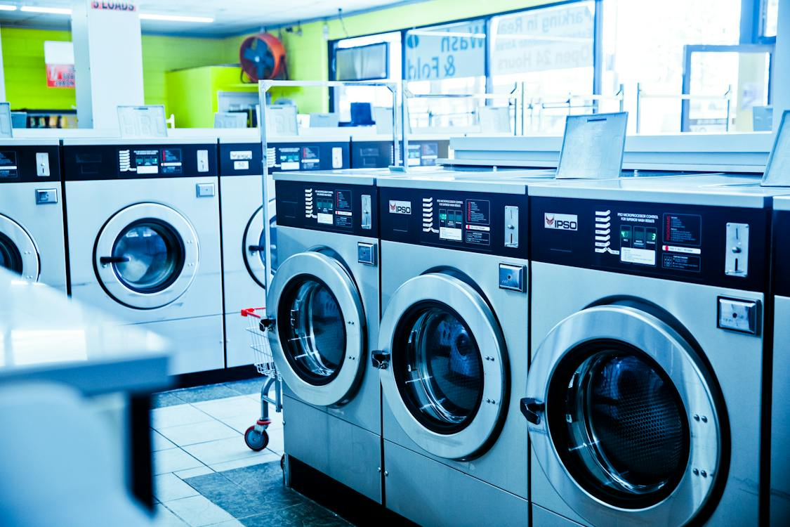 Front-load washing machines placed next to one another